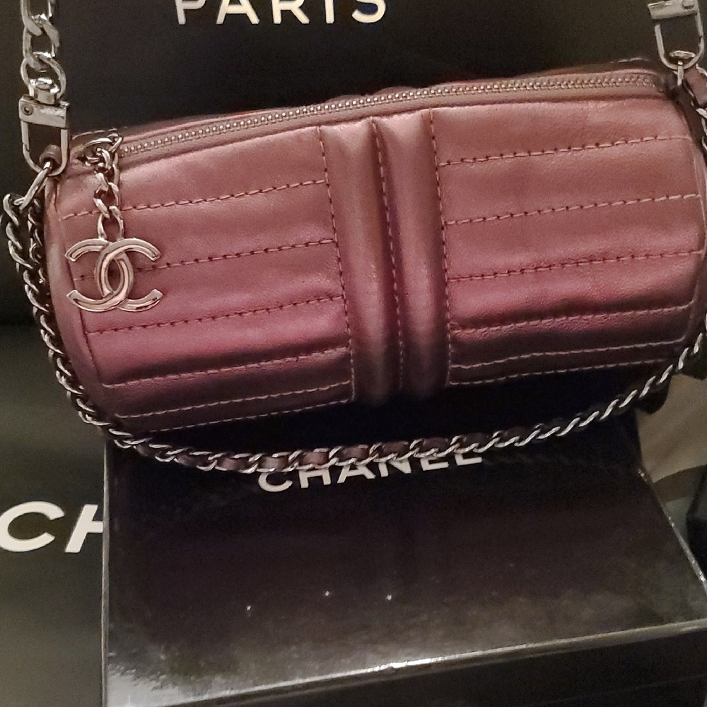 Chanel Metalic Purple Quilted Barrel Shoulder Bag With Iconic CC Zipper Pull.